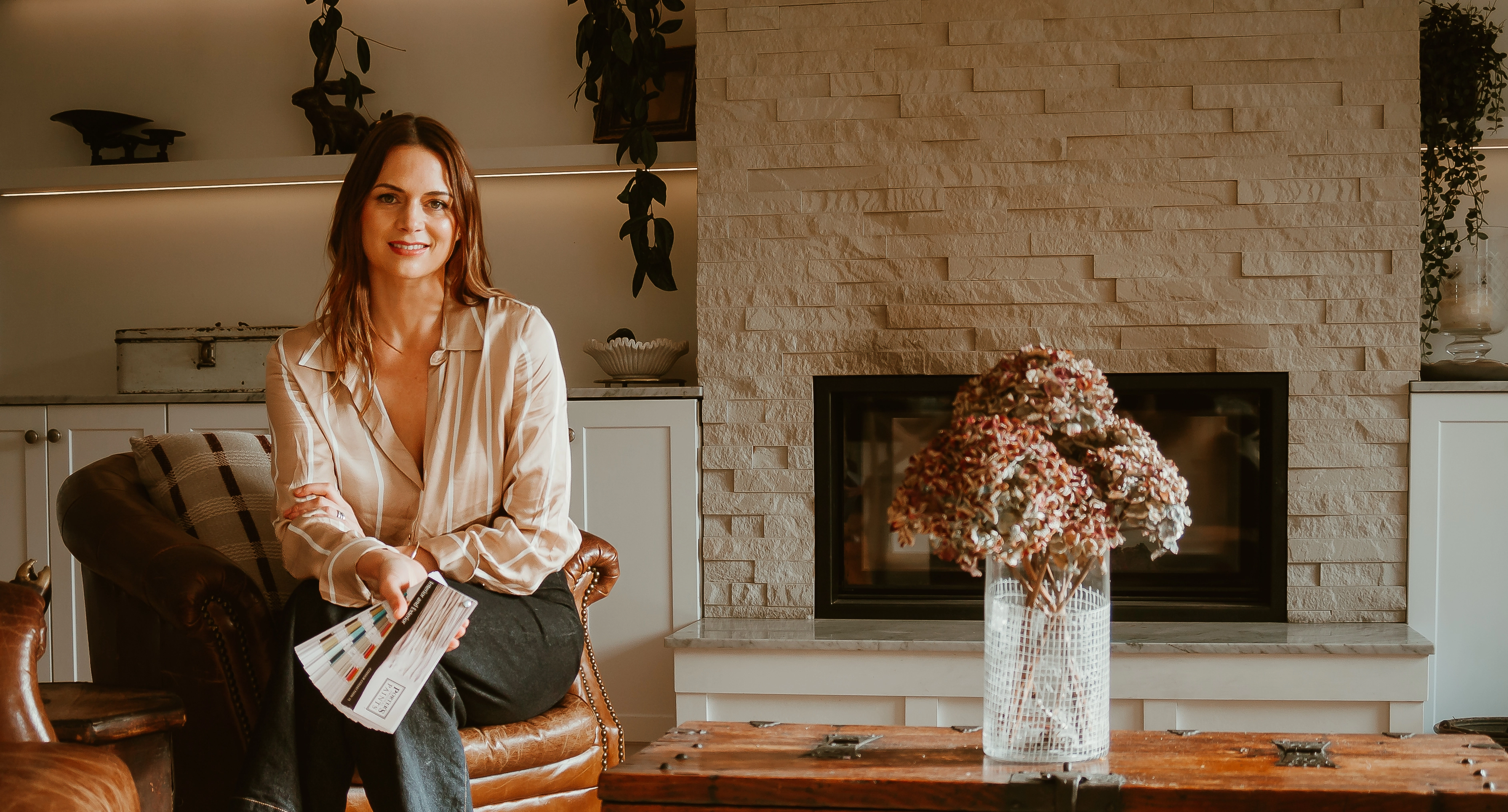 Luxurious master bedroom with dark tones and elegant lighting